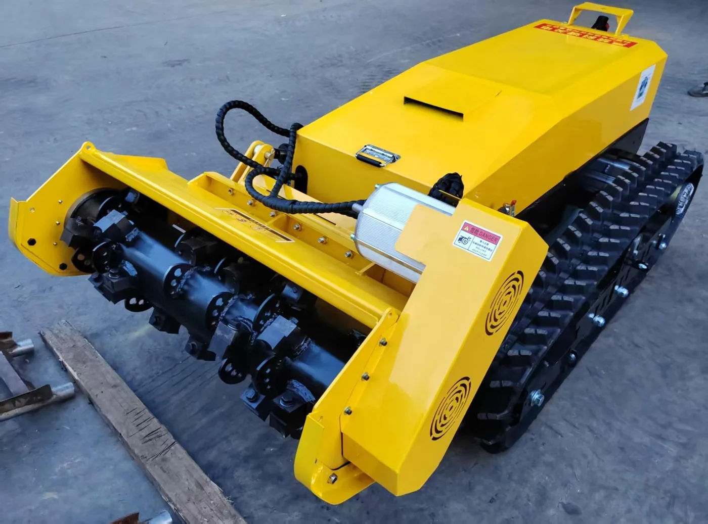 Cronus tracked remote electric mower with front cutting deck
